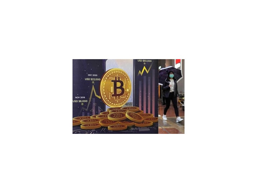ビットコインの広告＝2月、香港（AP＝共同）