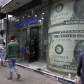 エジプト通貨、14％切り下げ 画像