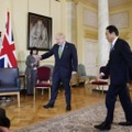 首相、福島ポップコーン持参 画像