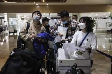 入国制限緩和、世界の潮流 画像