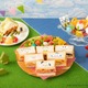 「はぴだんぶい わいわいピクニックカフェ」東京・愛知・大阪で開催 キャラデザインのサンドイッチやドリンクなど