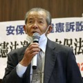 判決後、記者会見で話す原告団長の杉林晴行さん＝8日午後、広島市