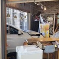 「南三陸さんさん商店街」の店舗内に突っ込んだ車＝9日午後、宮城県南三陸町（長嶋涼太さん提供）