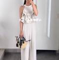 シンプルカラーをエッジィに着る。ひとクセある着こなしがオシャレな40代の夏スタイル 画像