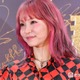 LiSA、アジアツアー美脚衣装ショット公開「躍動感がすごい」「網ソックスがセクシー」と絶賛の声 画像